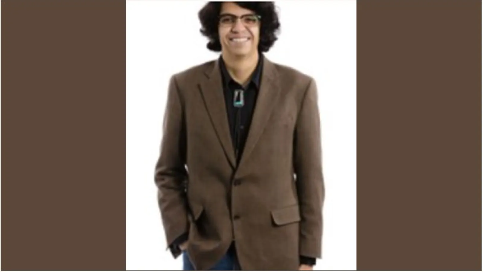Dr. Gregorio Gonzales with glasses and brown sport coat