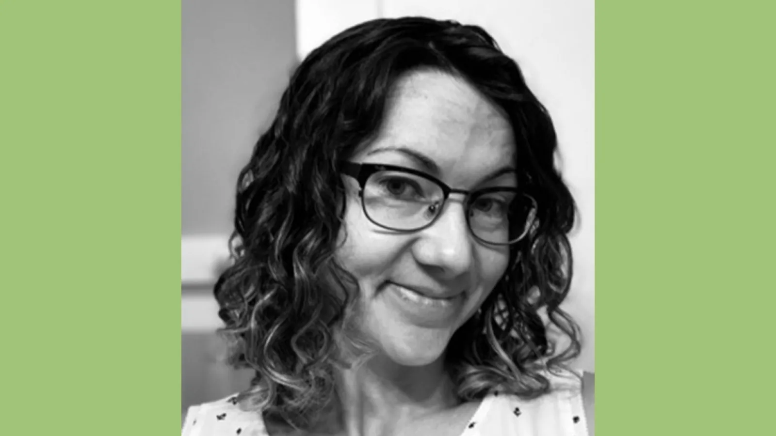 Black and white photo of Dr. Pérez with light green border