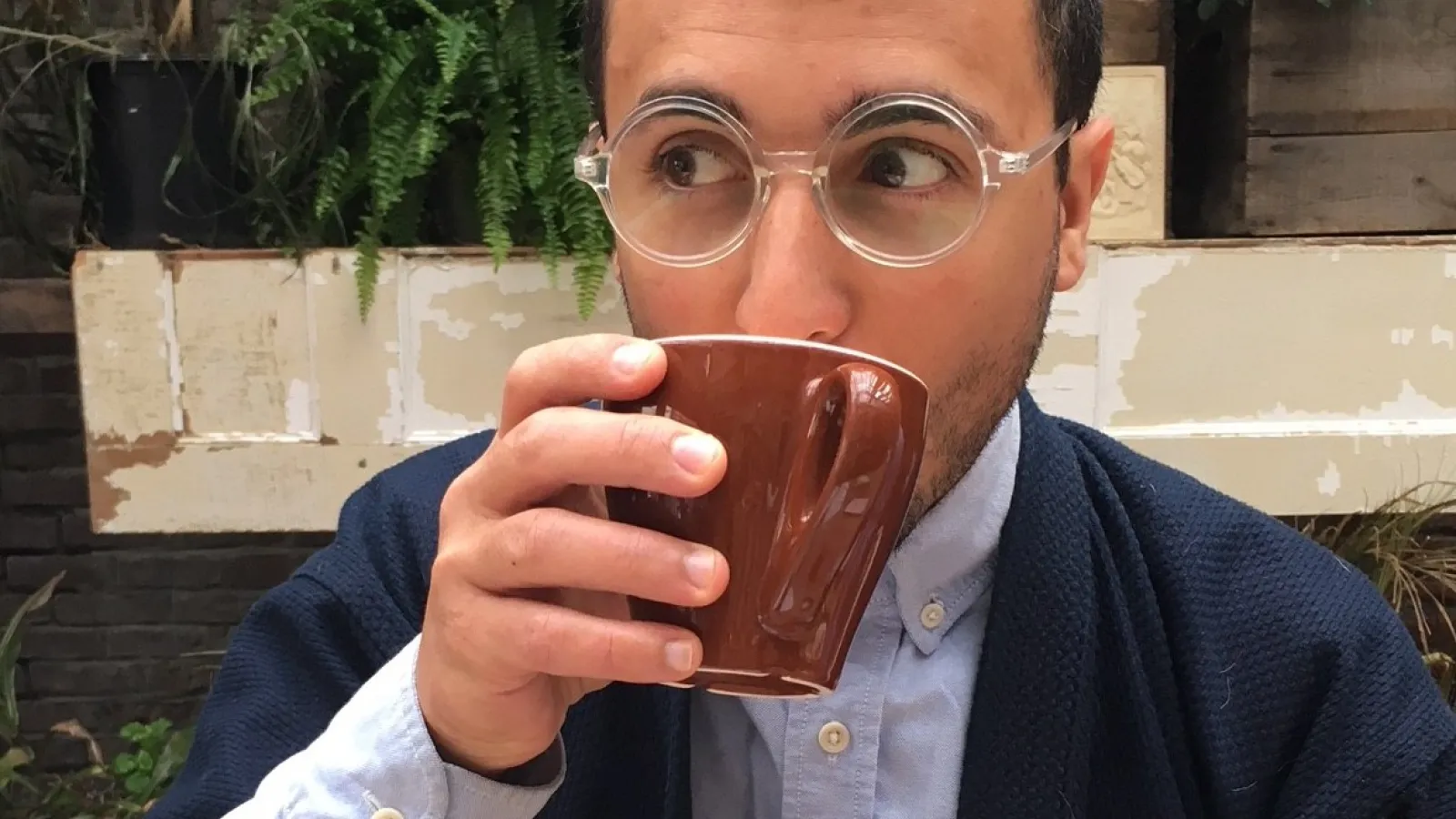 Photo of Dan DiPiero drinking out of a mug