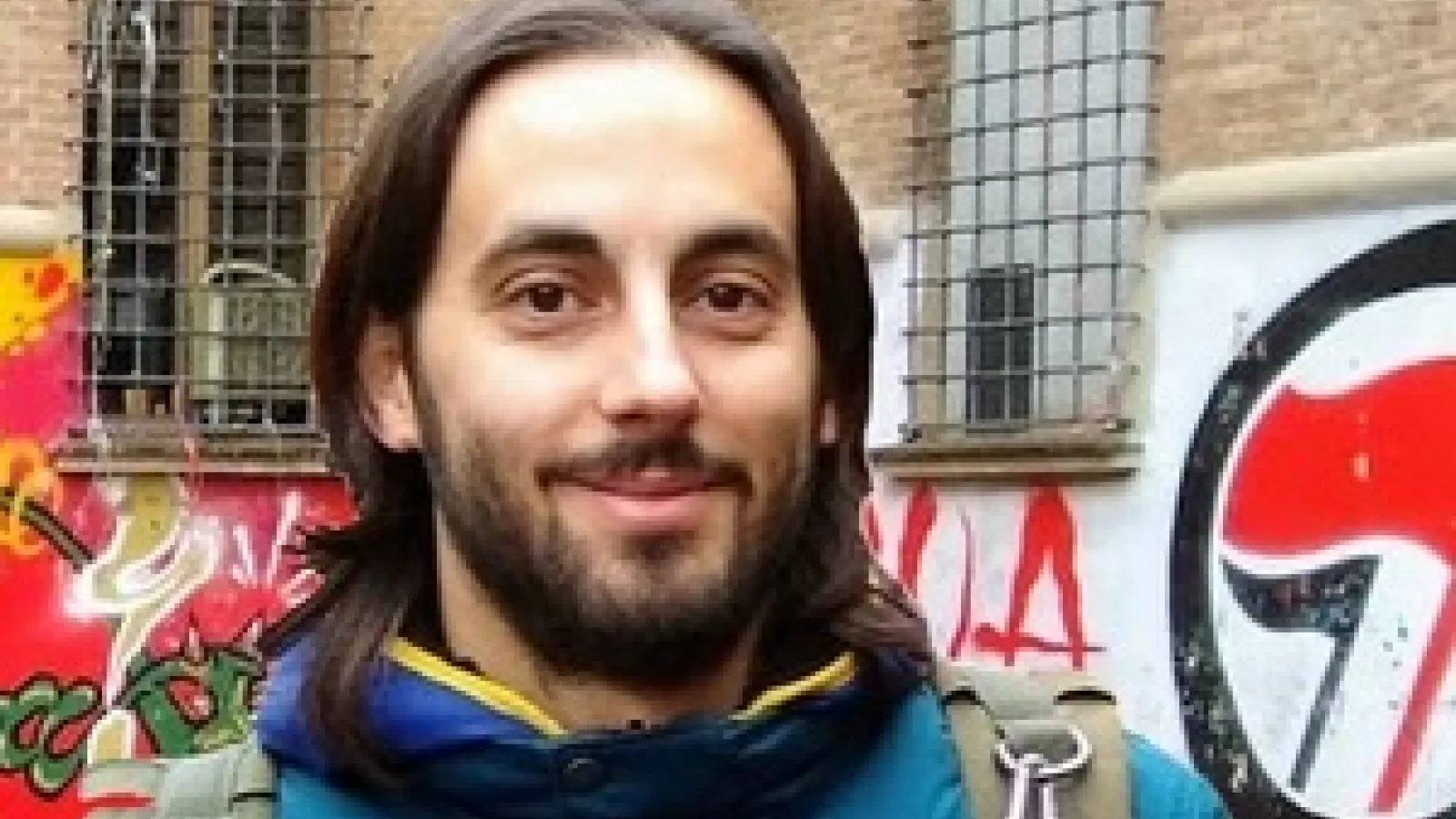 Enrico Zammarchi wearing a blue jacket