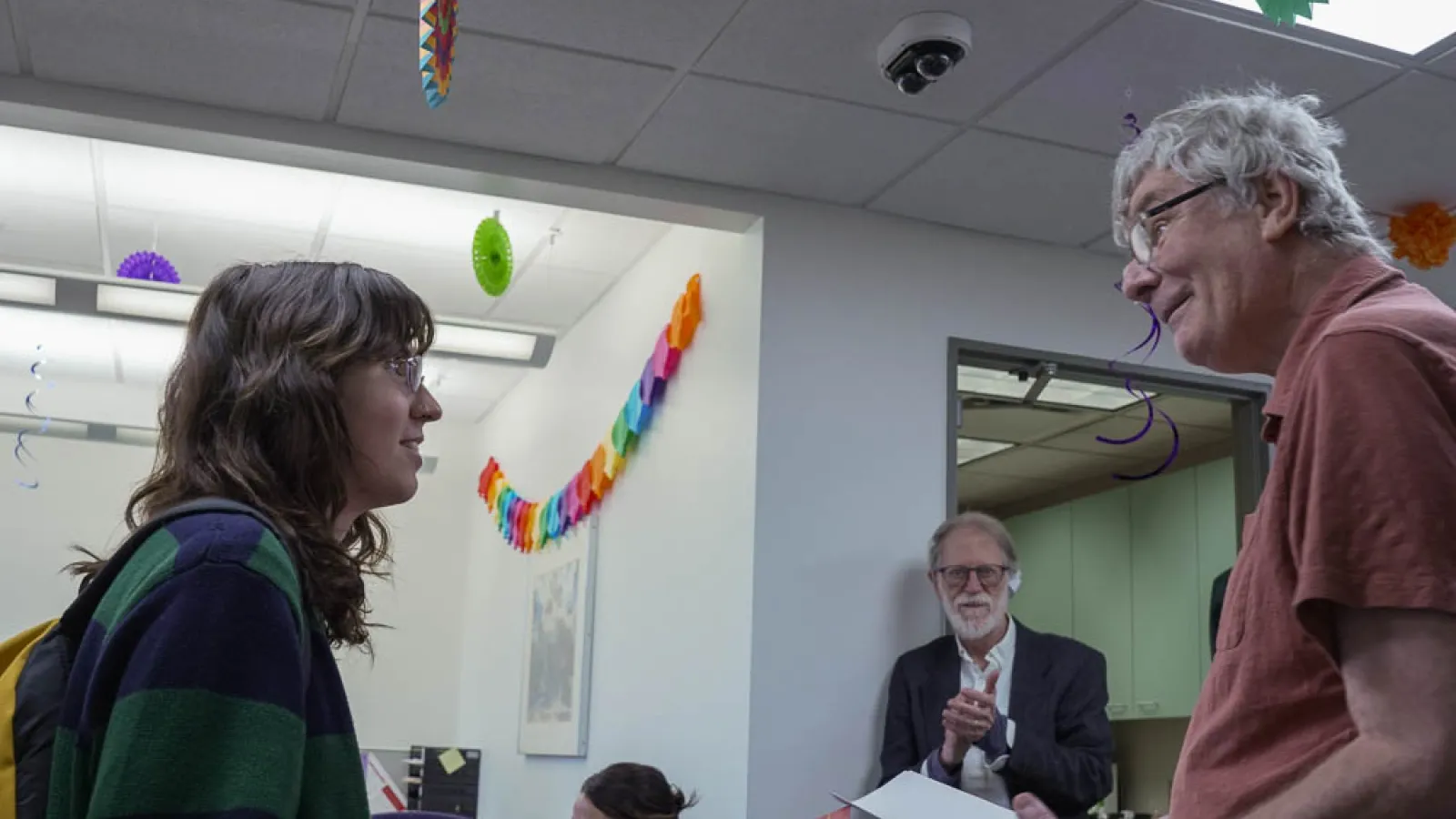 Department Chair Philip presents an award to Lee-Lee Knupp (left)