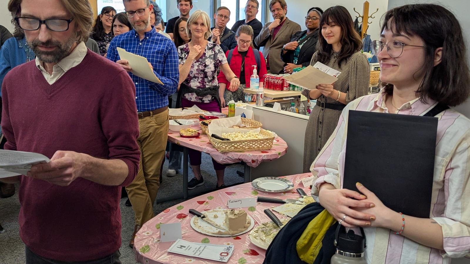 Hugh (left) presents Ilayda (right) with her award