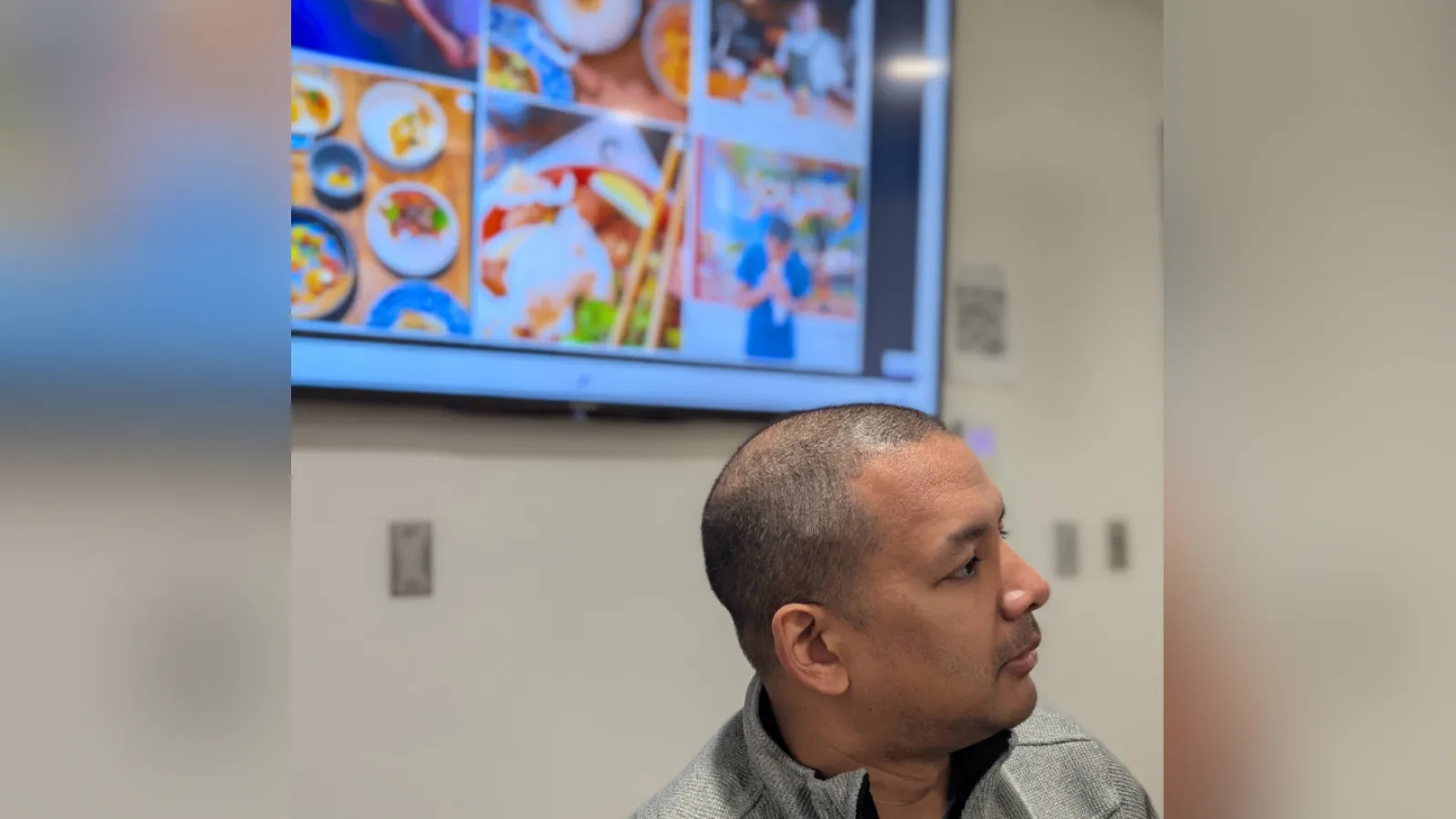 Chef Avishar responding to a question, with a photo collage on the screen in the background 