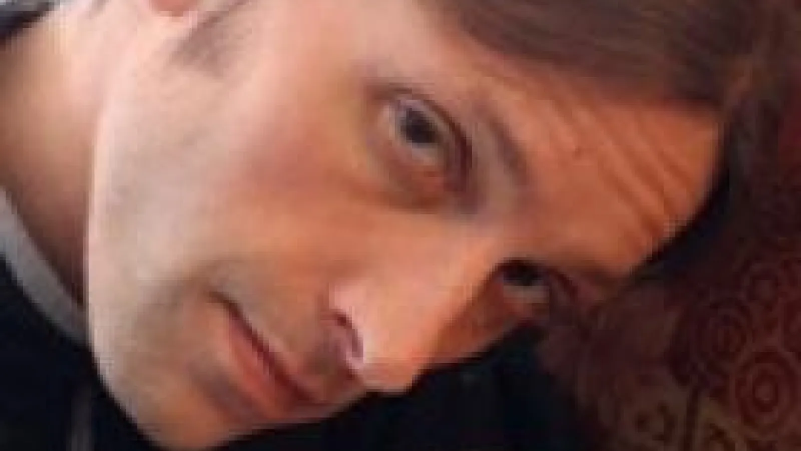 Professor Hugh Urban with his child