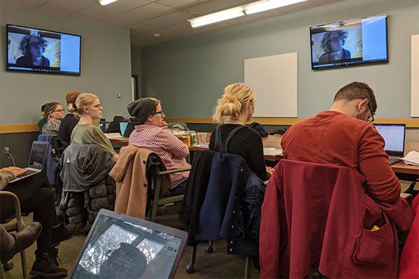 Photo of Livingston and graduate students