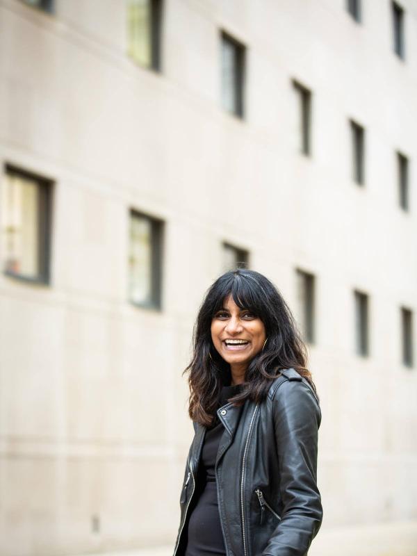 photograph of sampada aranke posing in front of The Art Institute of Chicago in a photograph taken by Kristie Kahns. 