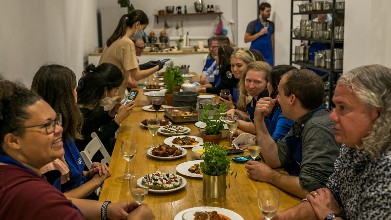 Diners sitting around a long table