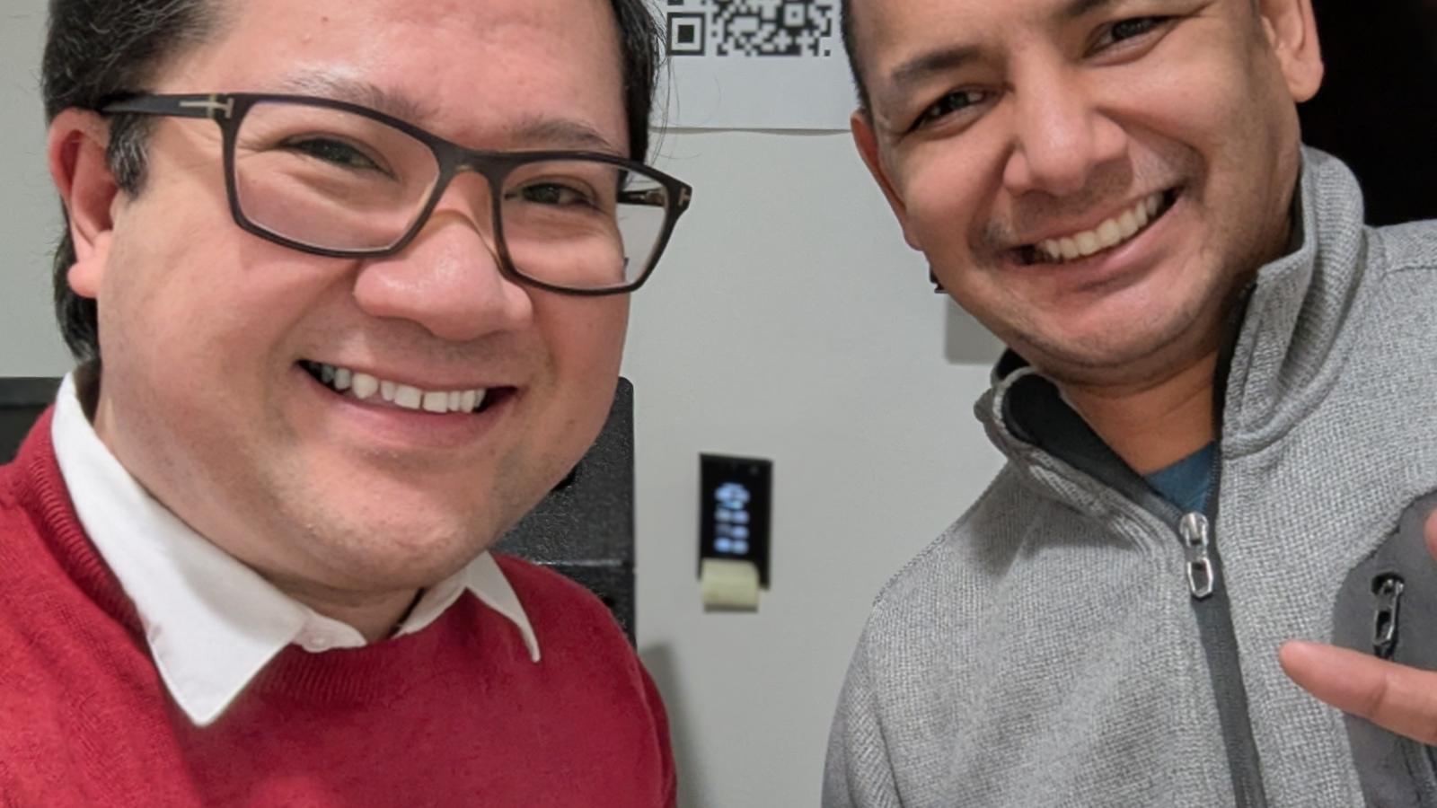 Mark Anthony and Avishar with some of the fried rice that Avishar brought to share with the class