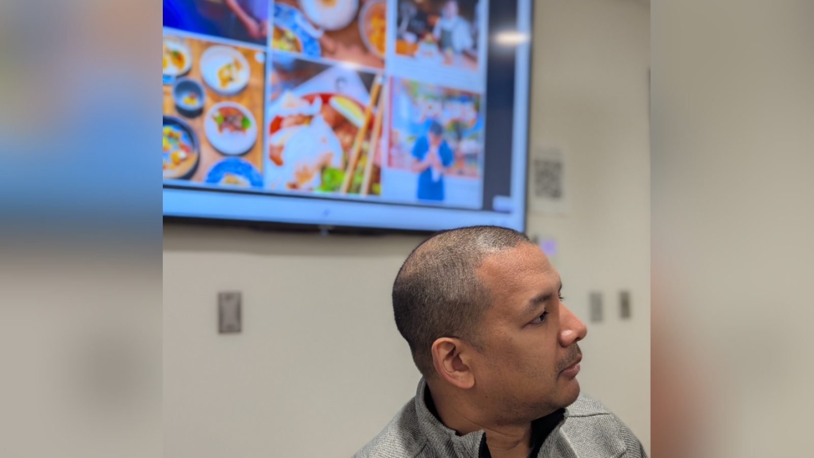 Chef Avishar responding to a question, with a photo collage on the screen in the background 